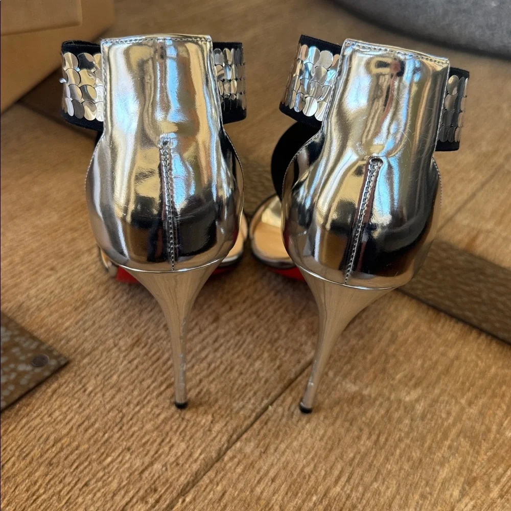 Christian Louboutin preowned please